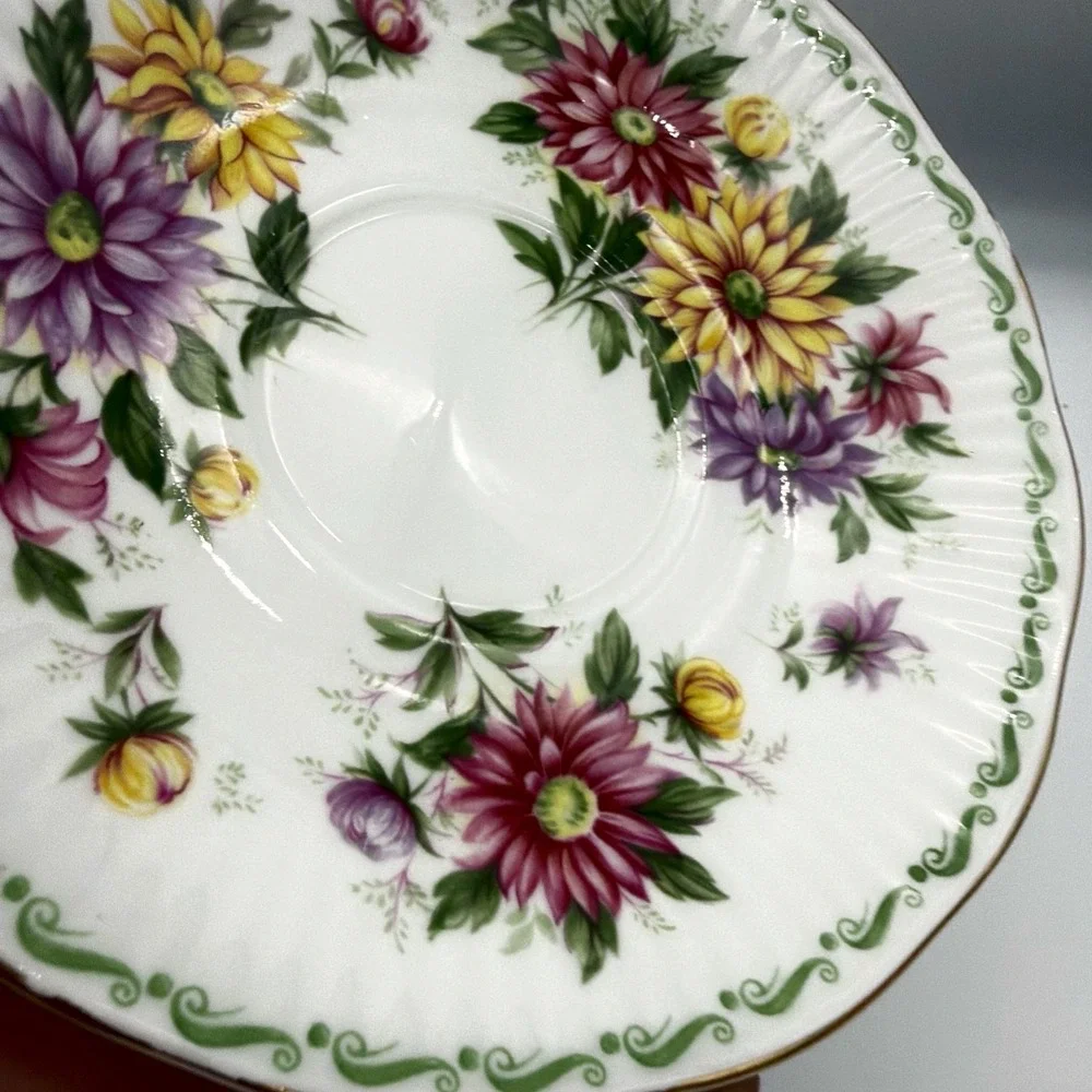Vintage Queen's Rosina Wild Flowers fine bone china Tea cup with matching saucer